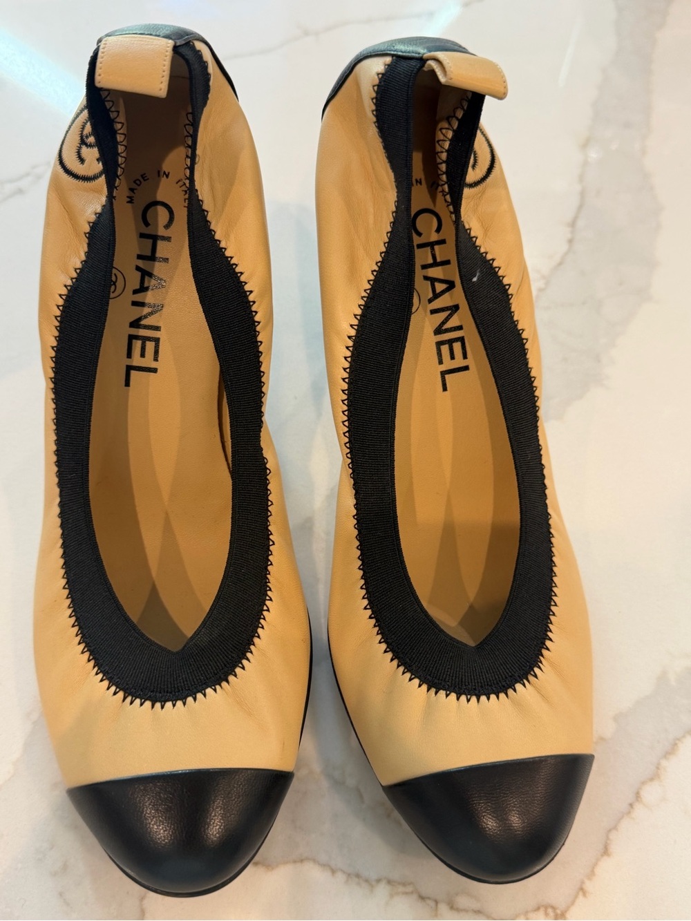 CHANEL Two-Tone Beige and Black Leather Ballet Pumps